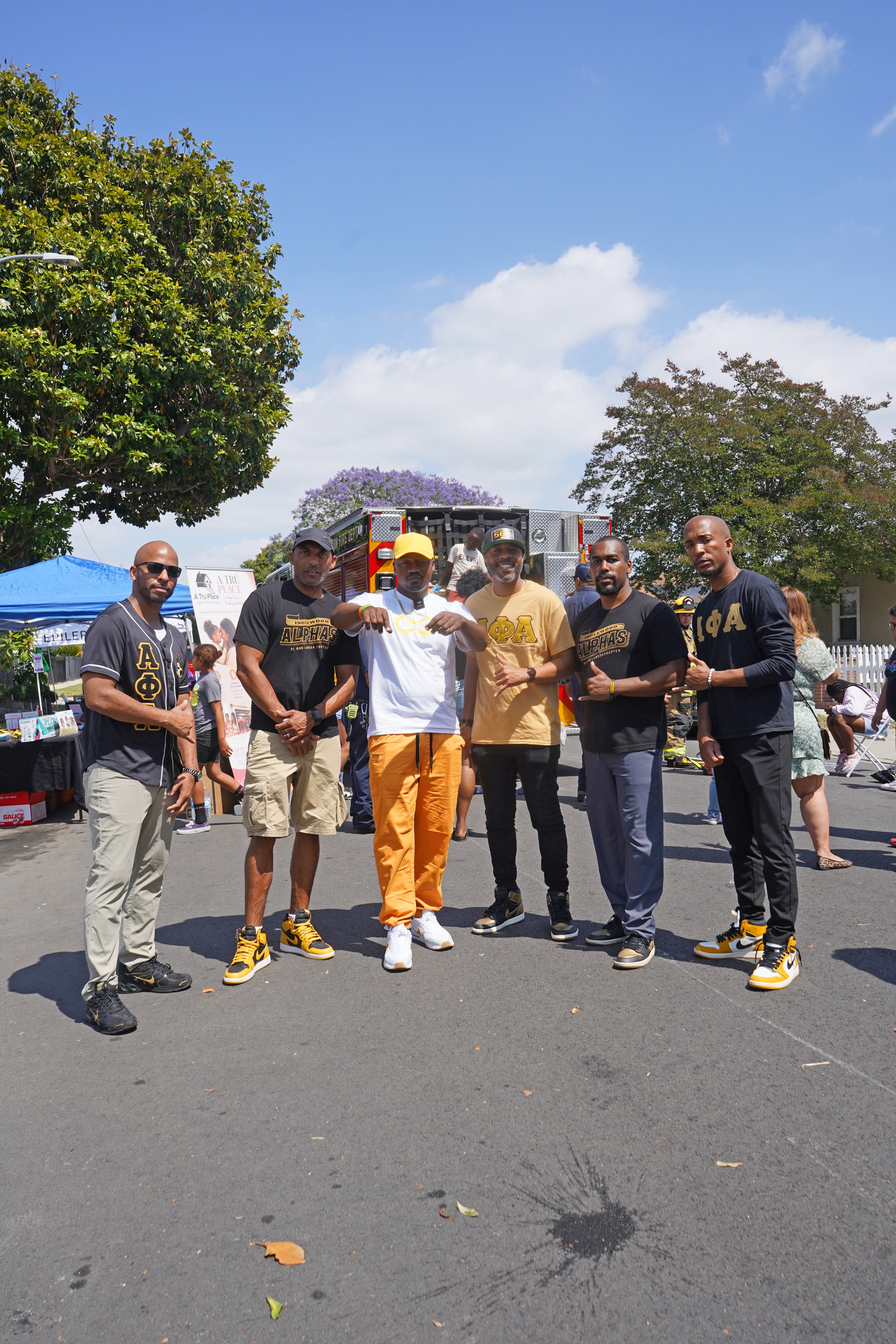 Community partners and supporters posing together at the Compton field day