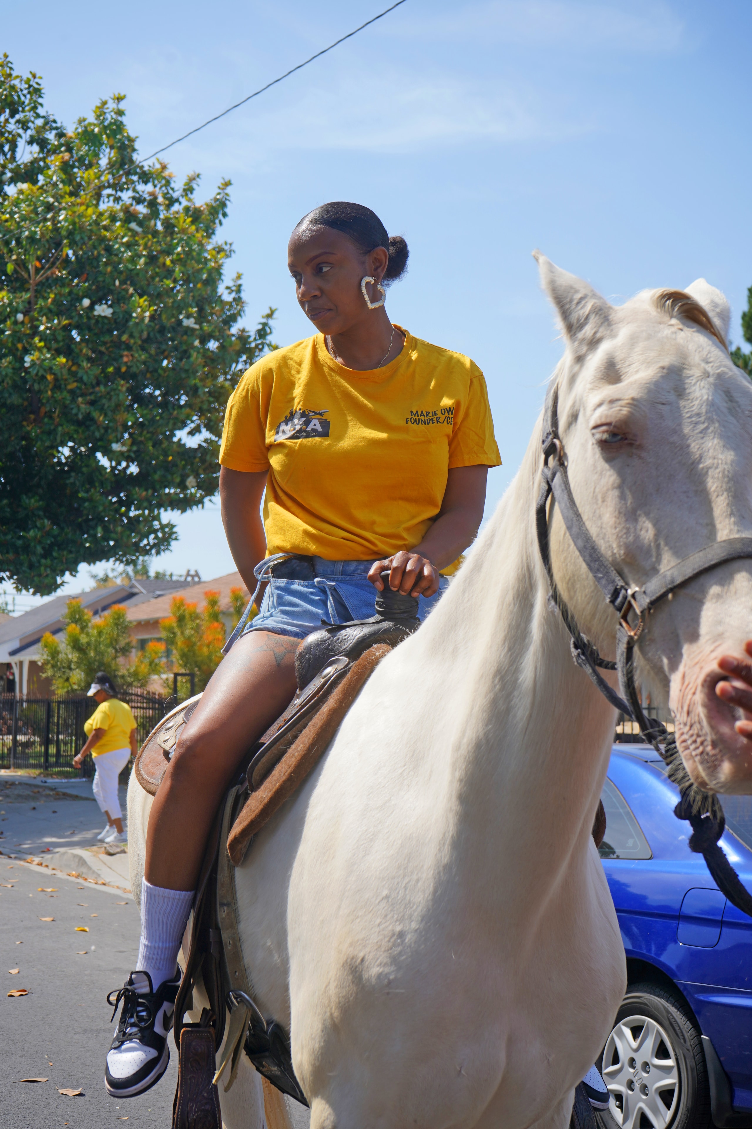 DSE Founder riding a white horse at the Compton field day