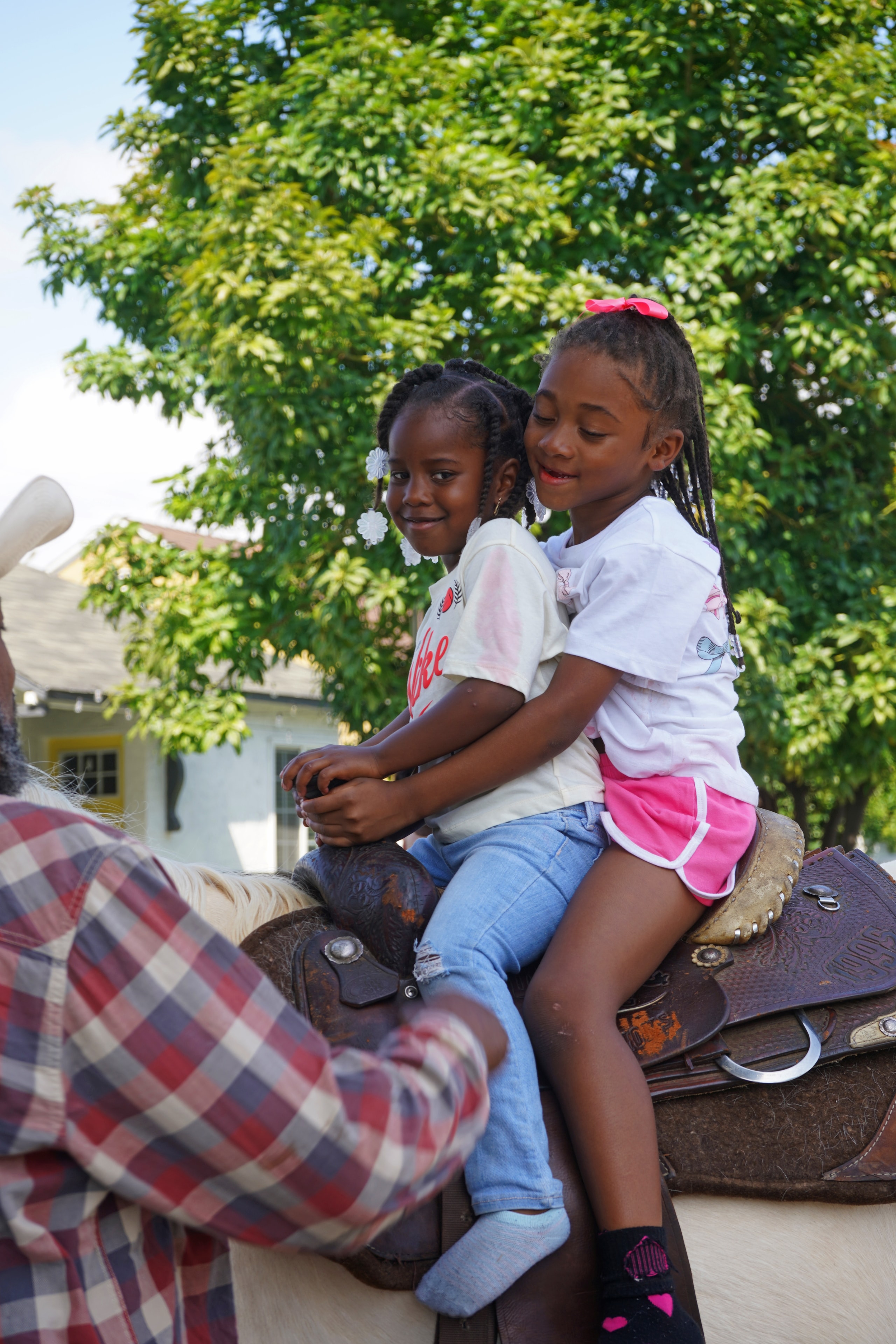 Young boy enjoying a horse ride at the Compton field day