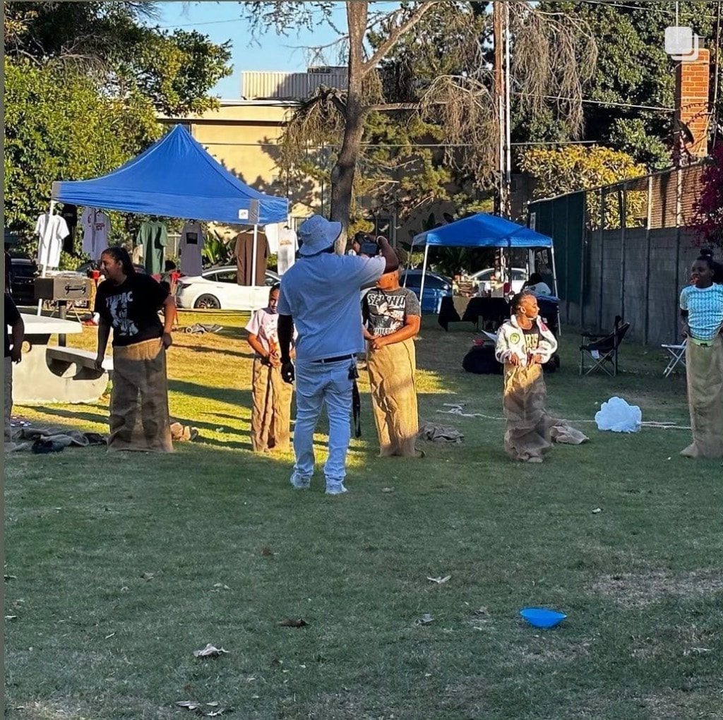 Participants competing in a sack race at the November 2023 event